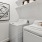 a white room with a washer and dryer