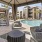 a pool with chairs and umbrellas