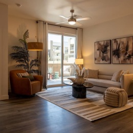 a living room with a glass balcony door