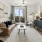 a living room with a couch and coffee table