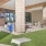 a deck with tables and corn hole