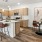 a kitchen with a dining table and chairs and a kitchen island