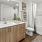 a bathroom with a tub sink and toilet