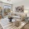 a living room with a rug and a couch and chairs